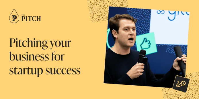 Founder speaking into a microphone during a startup pitch