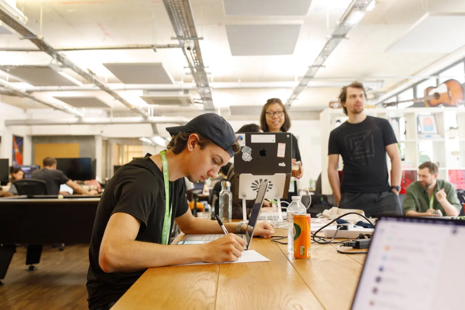 Builders working at desks during a hackathon at Ramen Space